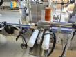 Etiquetadora autom�tica para botellas y tarros cil�ndricos planos Maqmundi
