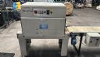 Selladora autom�tica en L con t�nel de retracci�n.