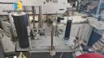 Etiquetadora autom�tica de doble cabezal para botellas planas Bauch Campos