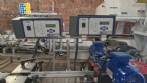 Etiquetadora automtica de doble cabezal para botellas planas Bauch Campos