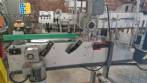 Etiquetadora autom�tica de doble cabezal para botellas planas Bauch Campos