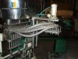 Llenadora lineal con sistema de termoformado