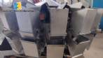 M�quina envasadora a b�scula multicabezal Mqpack