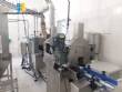 Lnea para llenado de salmuera, insercin manual de producto y taponado automtico
