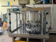 Llenadora rotativa de acero inoxidable con 16 boquillas IMSB para botellas y frascos