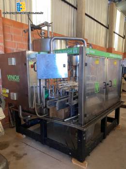 Llenadora rotativa gravimtrica de acero inoxidable con cabina