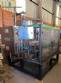 Llenadora rotativa gravimtrica de acero inoxidable con cabina