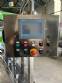 Llenadora rotativa gravim�trica de acero inoxidable con cabina