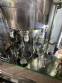 Llenadora rotativa gravim�trica de acero inoxidable con cabina