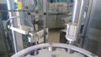 Lnea para mquina de llenado de aerosol Cosmar Omas