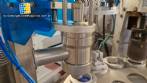 M�quina rotativa de acero inoxidable para llenado, dosificaci�n y sellado, con junta de aluminio, para tarros, vasos y botellas Delgo.