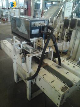 Sellador de cajas de cartn con pegamento termofusible Jemak