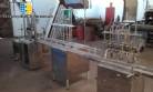 Empaquetador lineal con 6 boquillas de acero inoxidable