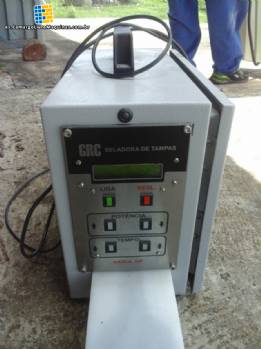 Sellador por inducci�n para tapas GRC