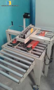 Caja selladora con cinta adhesiva Caja selladora con cinta adhesiva