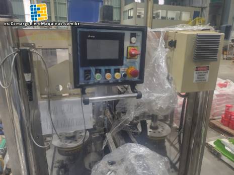 Etiquetadora automática de acero inoxidable con dos cabezales para etiquetas autoadhesivas Narita Etiquetadora automática de acero inoxidable con dos cabezales para etiquetas autoadhesivas Narita